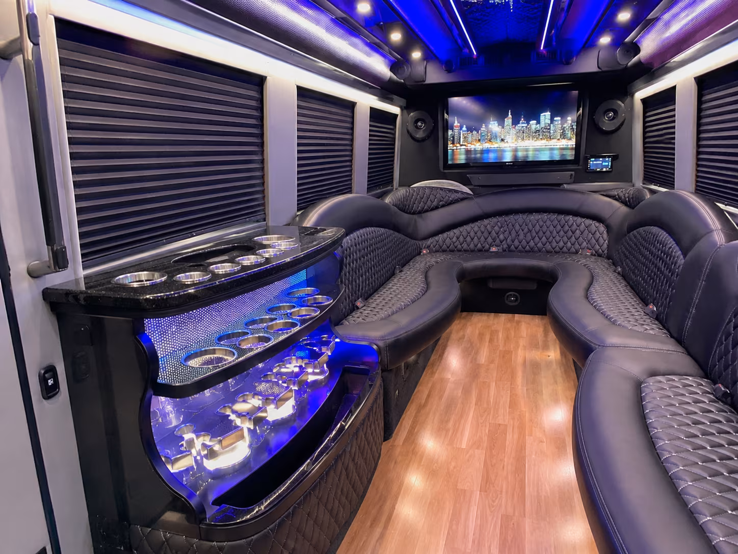 Wedding guests seated inside a party bus serving San Antonio